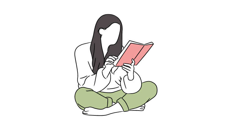 ブログに疲れて本を読んでいる女性